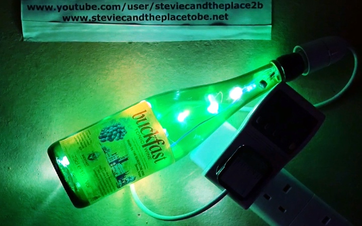 A custom lightbulb made from a Buckfast Tonic Wine bottle